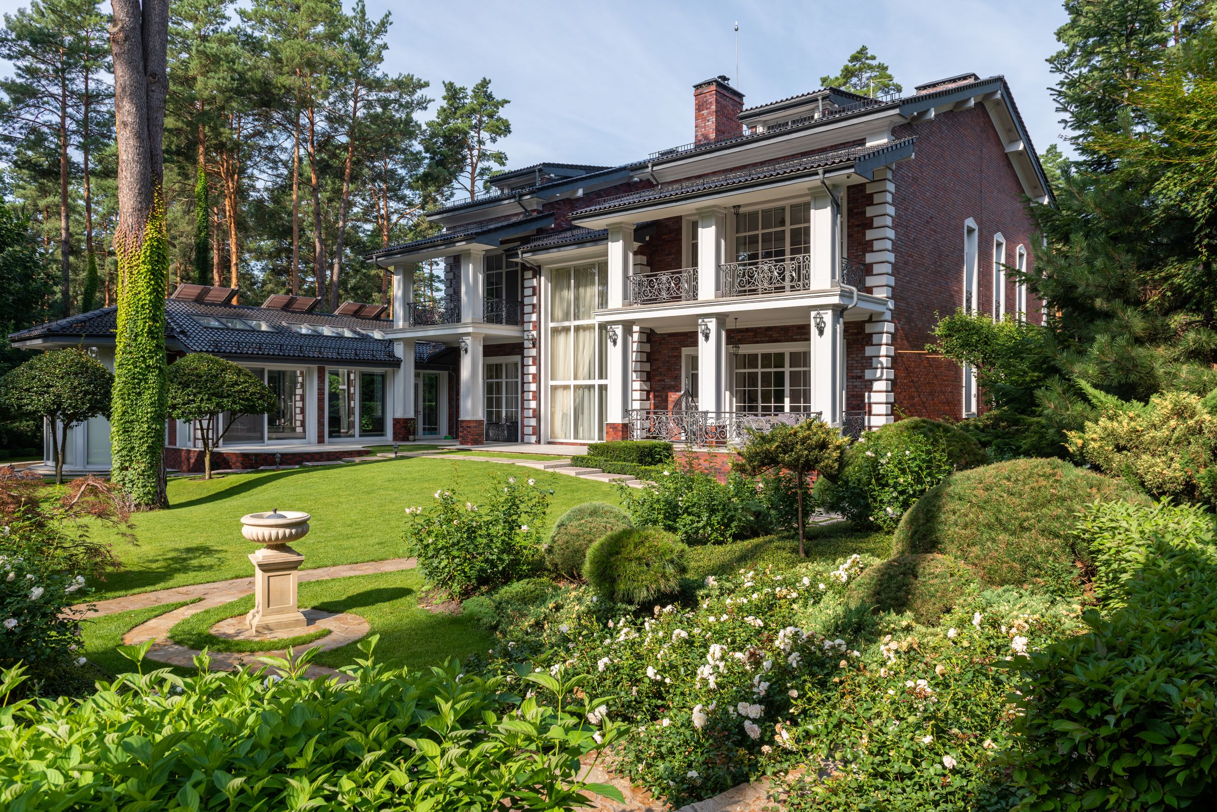 Green lawn with landscaped garden beds